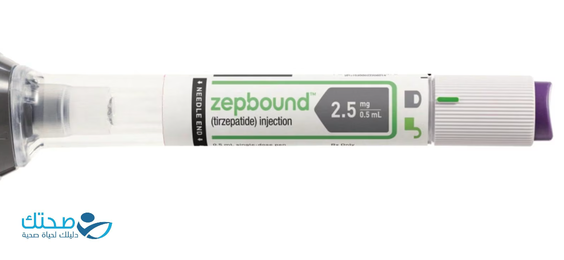 A white and green tube with a label

Description automatically generated