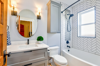 things to consider while designing your bathroom remodel circular vanity mirror bathtub shower custom built michigan