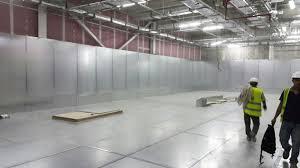 A large room with a metal wall and ceiling

Description automatically generated with medium confidence