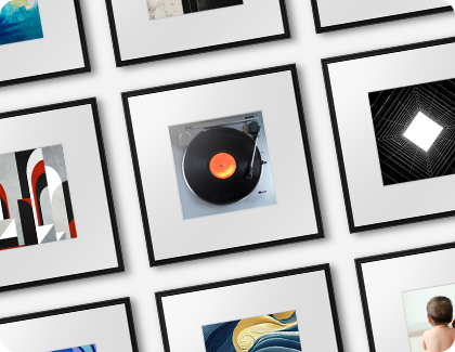 Several Samsung Music Frames displayed on a white wall.