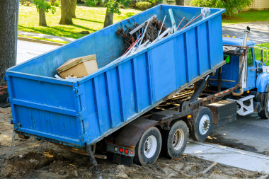 how to navigate hidden remodeling costs with design build contractors waste removal truck after remodel custom built michigan