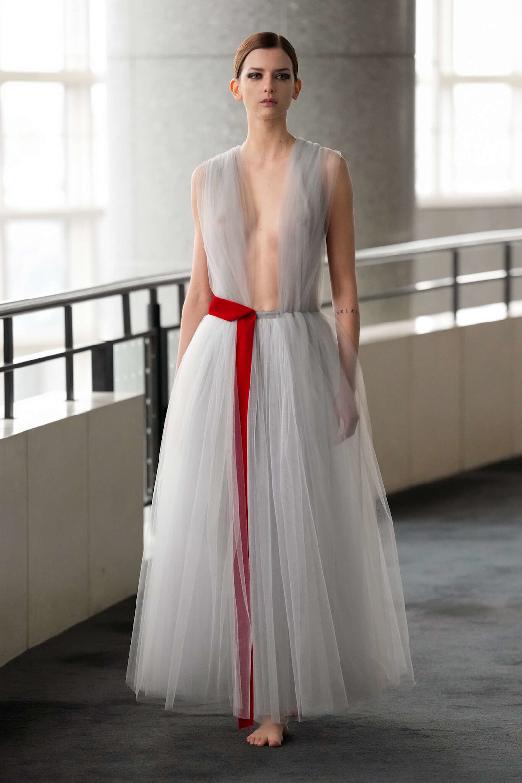 Picture of a model in sheer gown for the AELIS Haute  Couture  SS24