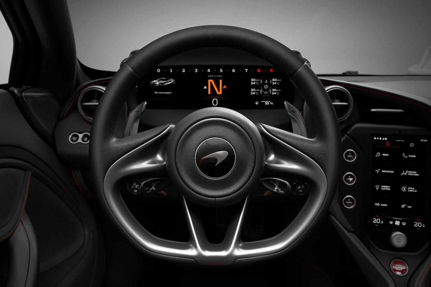 The steering wheel and dashboard of a car

Description automatically generated