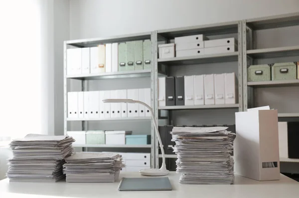 Stacks of documents stored properly in the filing cabinet