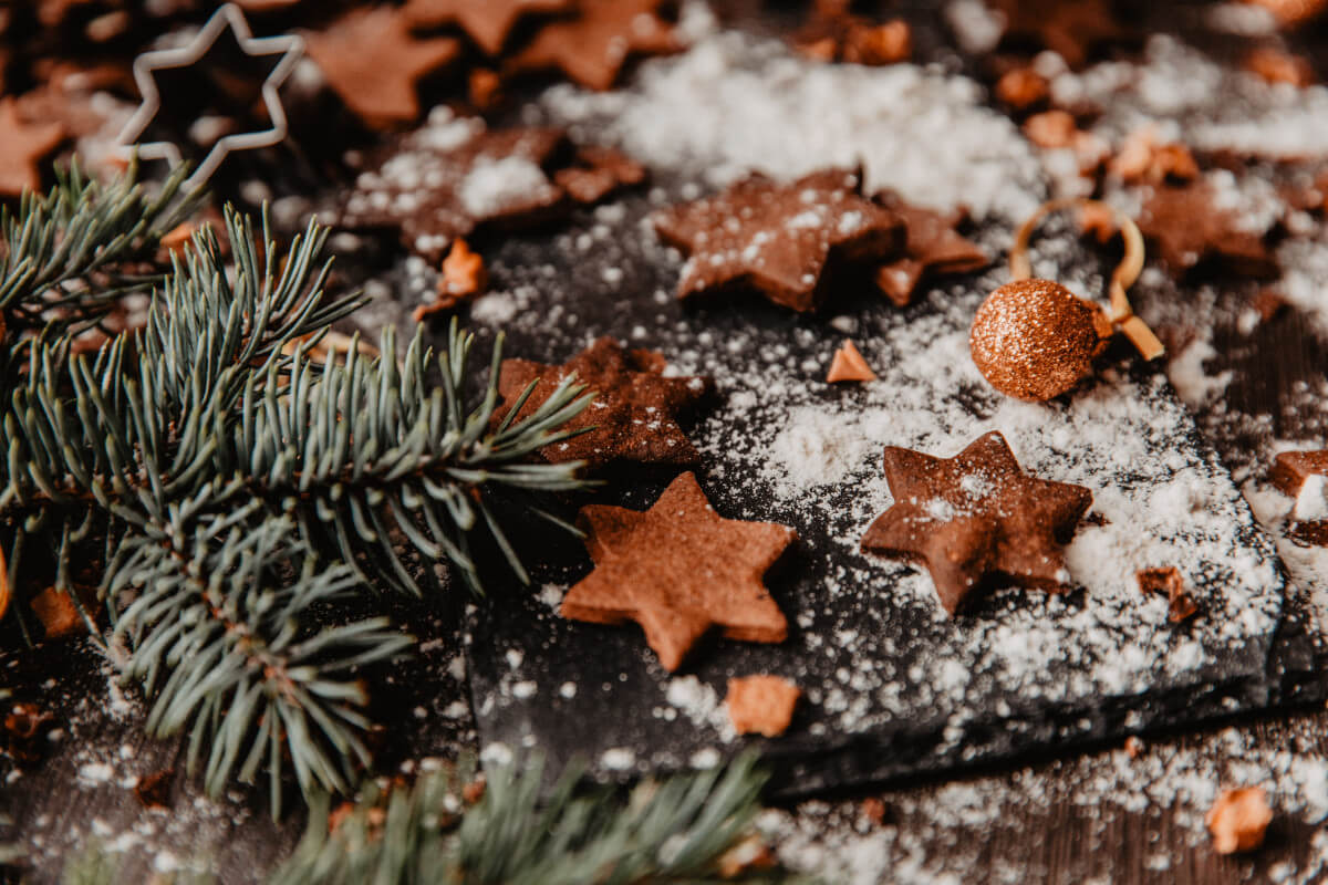 star holiday cookies next to a pine sprig