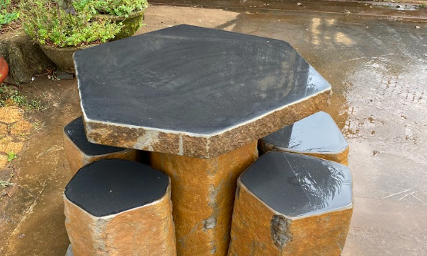 A stone table and seats