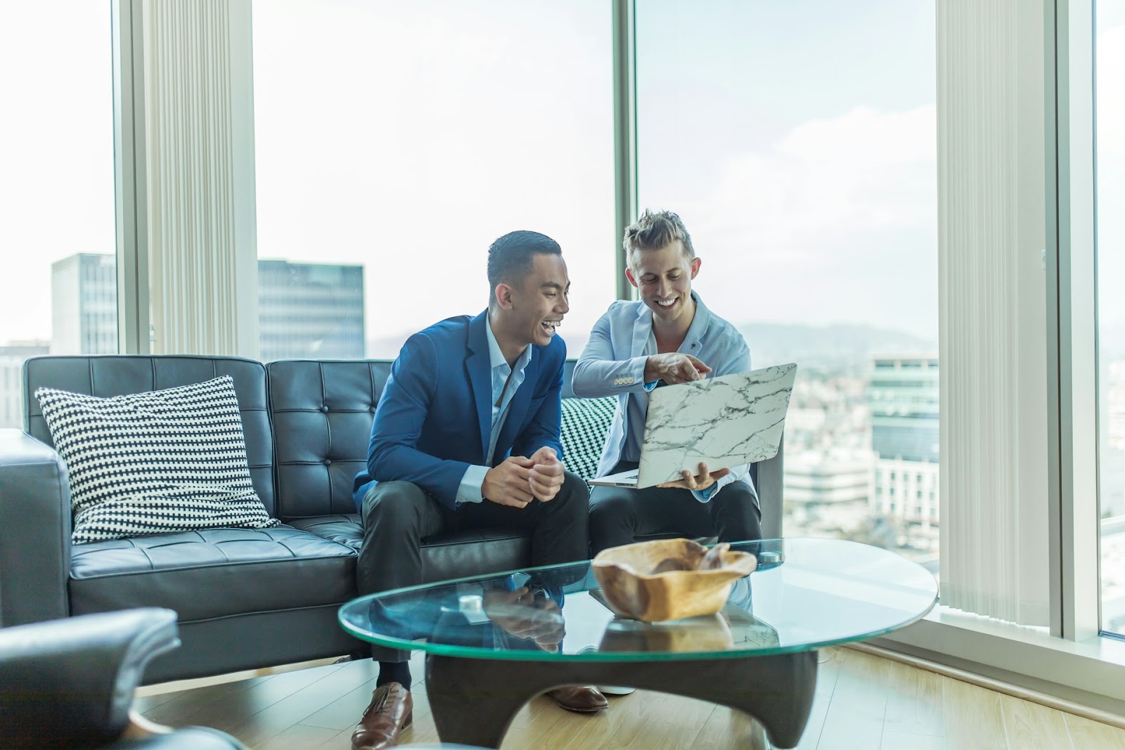 Two men discussing their operations