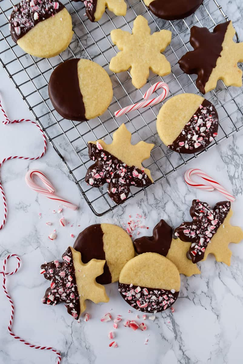 chocolate dipped sugar cookies with candy canes
