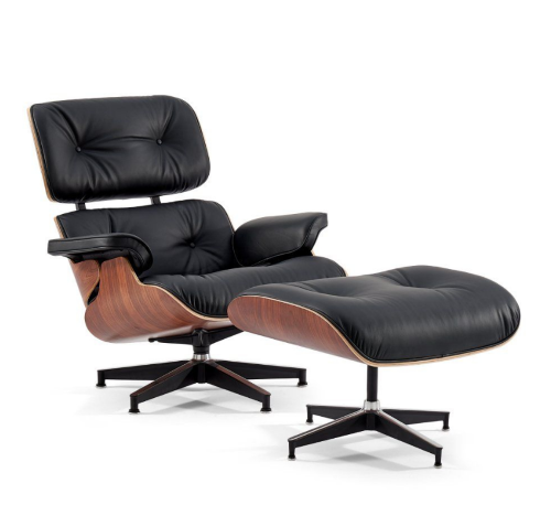A black leather chair and ottoman

Description automatically generated