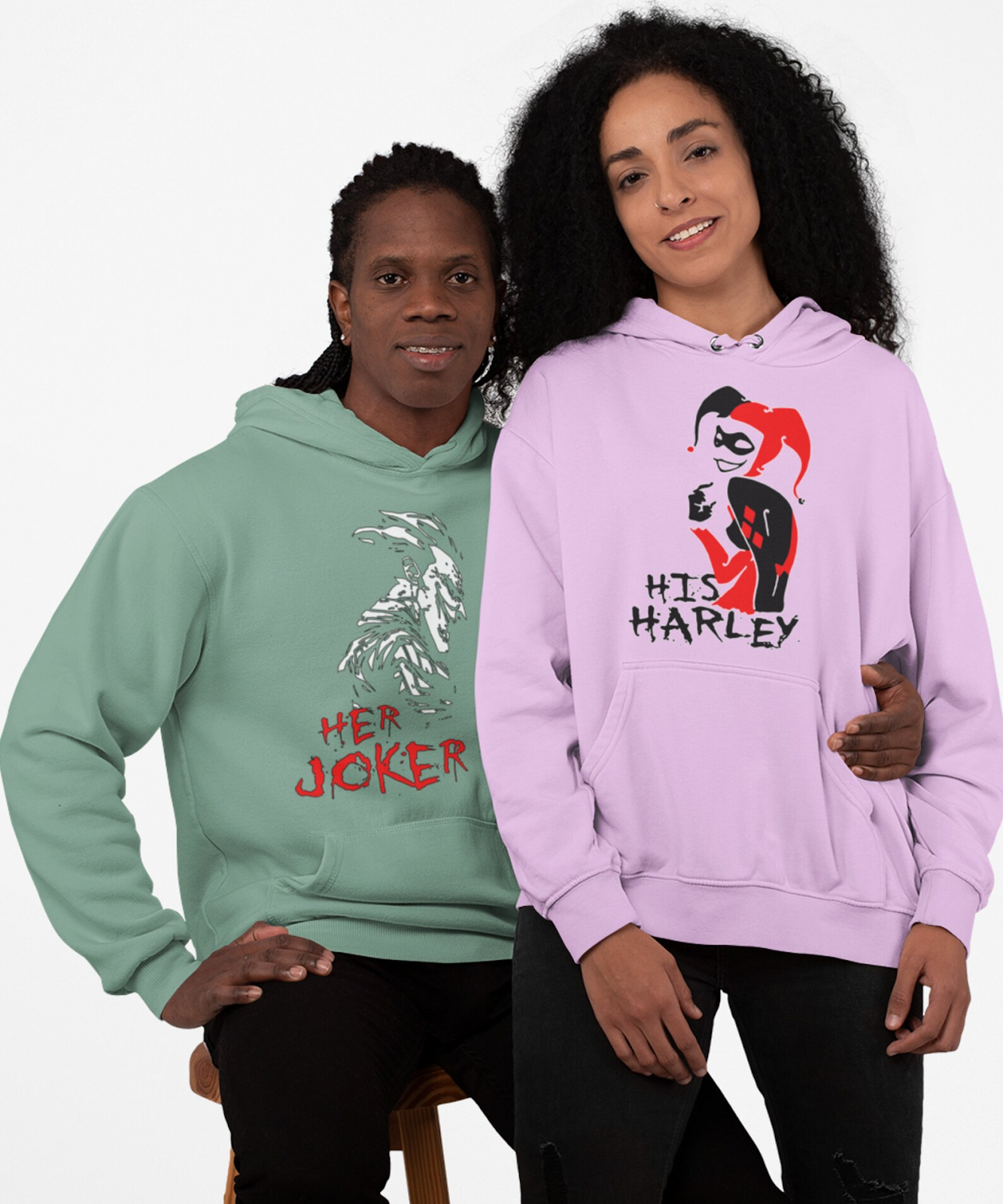 Couple wearing Harley Quinn and Joker hoodies