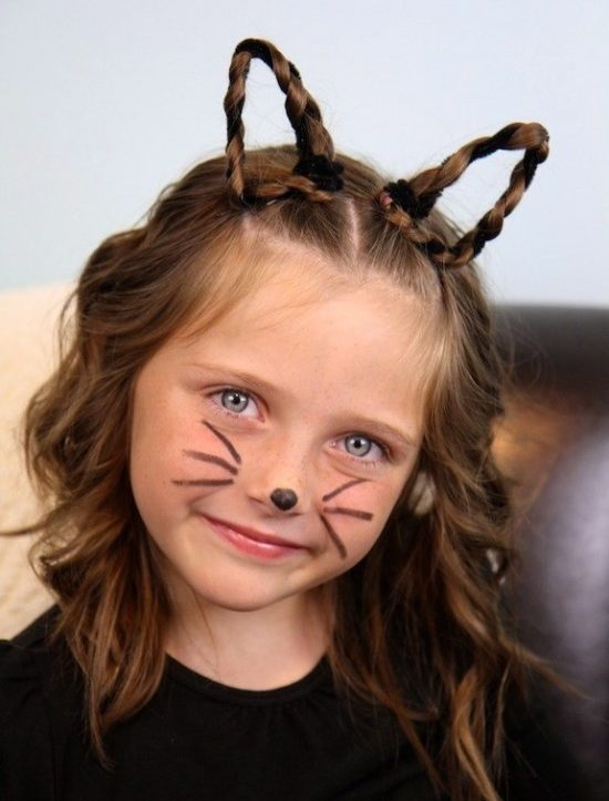 Full picture of a girl rocking rocking cat ears hair design for the crazy hair day event