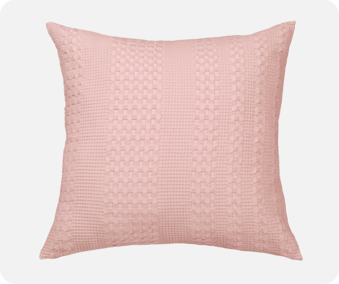 Our pink Waffled Cotton Euro Sham in Blush on a white background.
