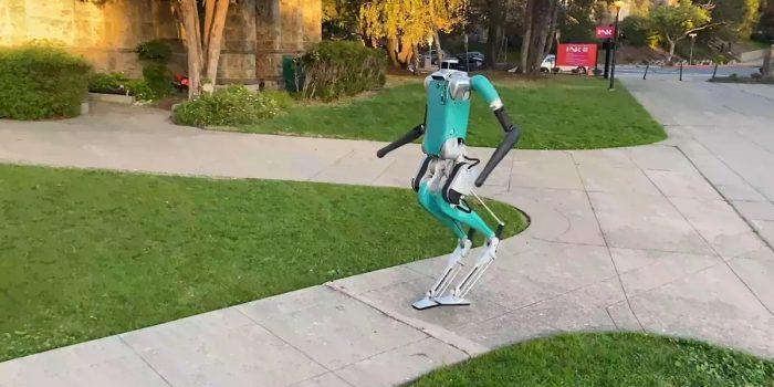 A robot walking on a sidewalk

Description automatically generated