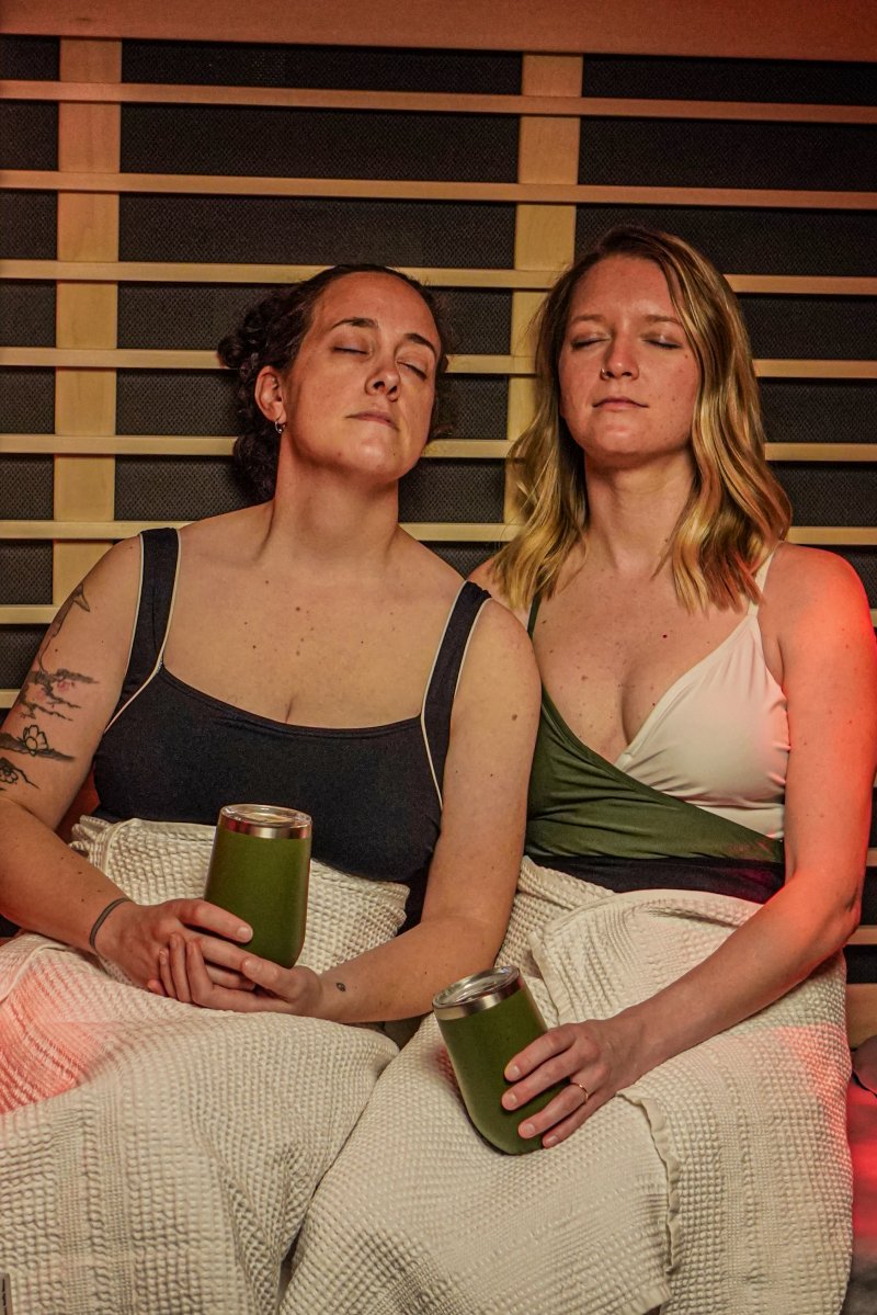 two women relaxing in an Infrared Sauna