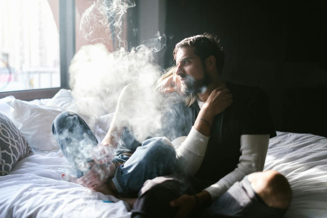 A couple vaping CBD together