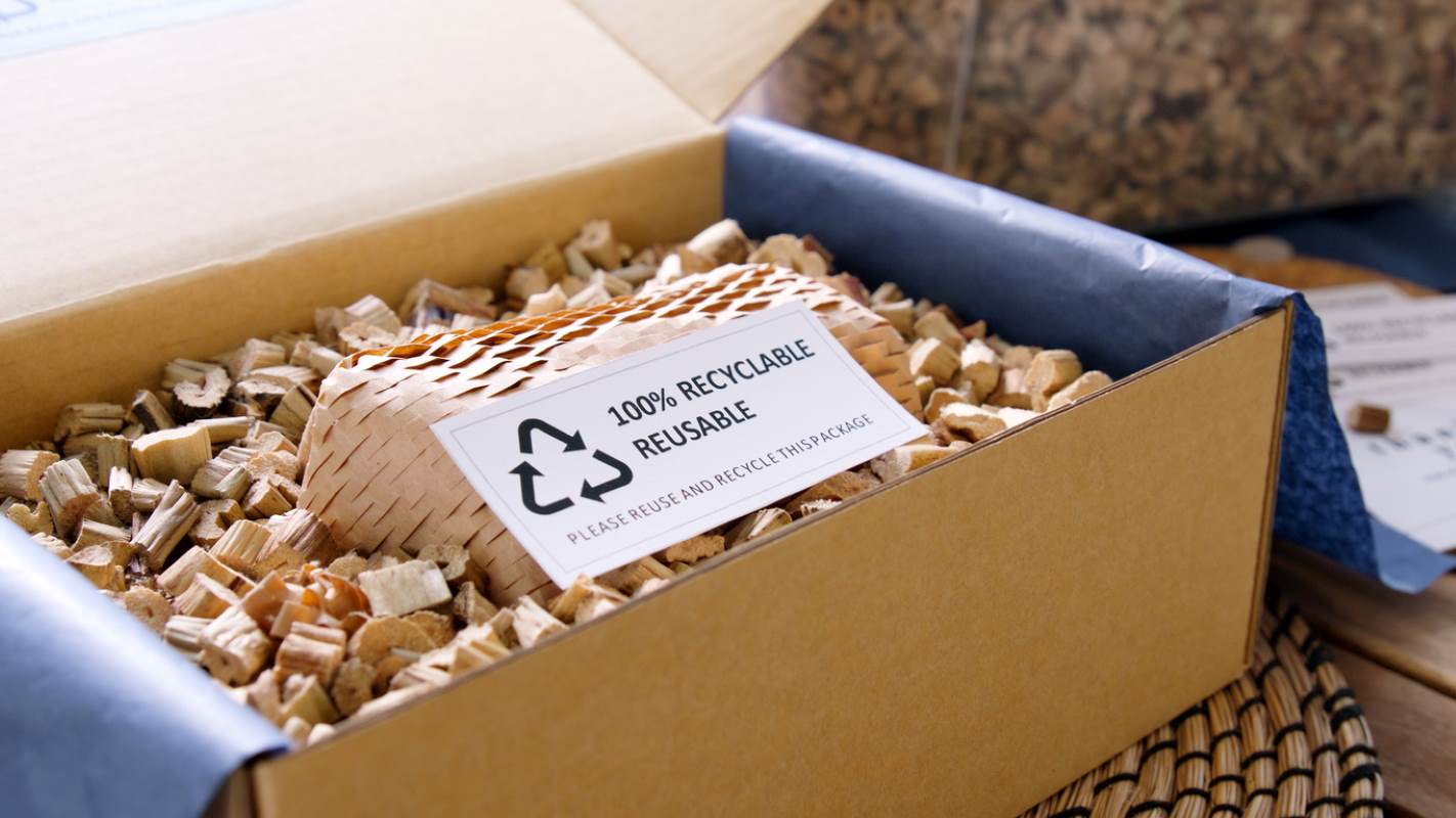 Eco-friendly package with a note asking to recycle or reuse the packaging.