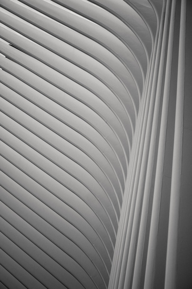 A white building facade with louvres designed using parametric design principles