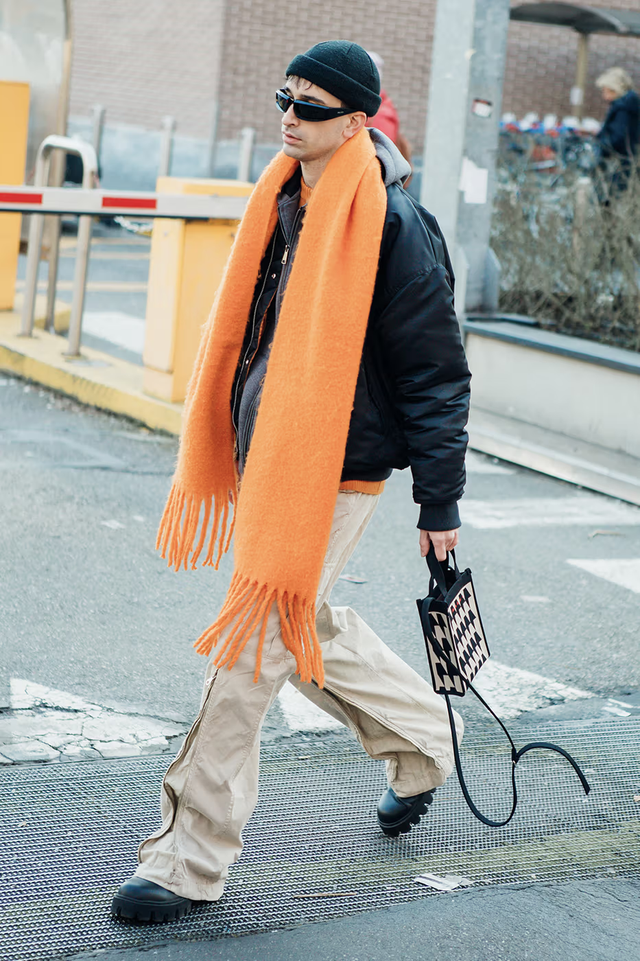 Picture showing a guy rocking a jacket  with jacket and scarf to accessorise