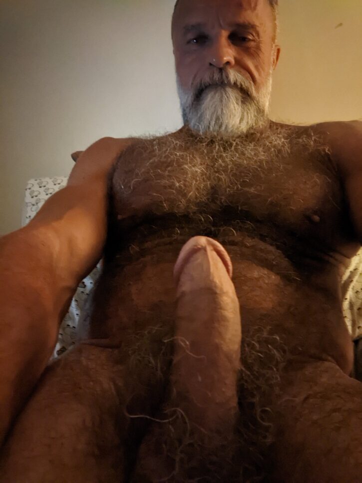 Daddy John naked taking an iphone selfie showing off his erect cut penis