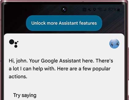 Google Assistant screen with Unlock more Assistant features displayed at the top