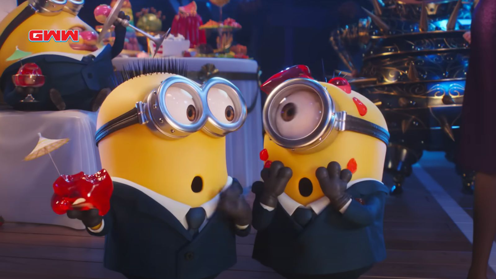 dos minions vestidos con traje y corbata están uno al lado del otro