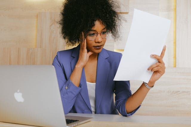 girl analyzing paper