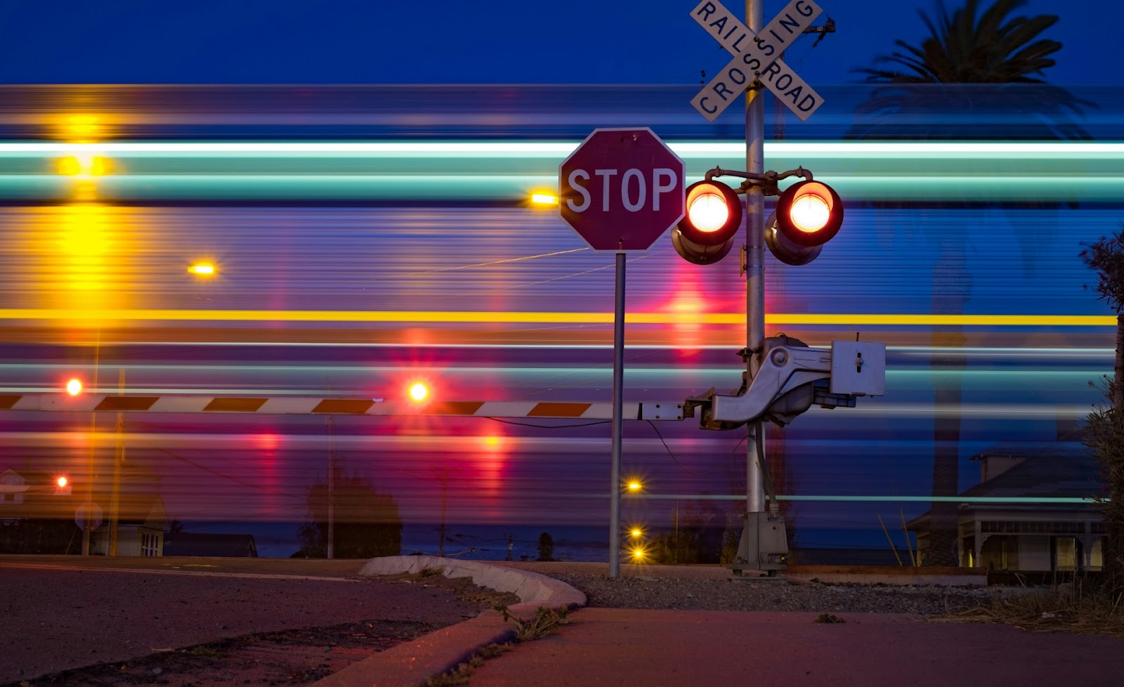 A train passing through a train crossing