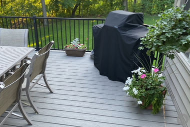 composite deck with BBQ grill and seating area custom built michigan