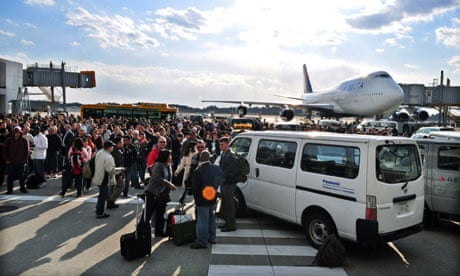 Passengers evacuate from the terminal bu