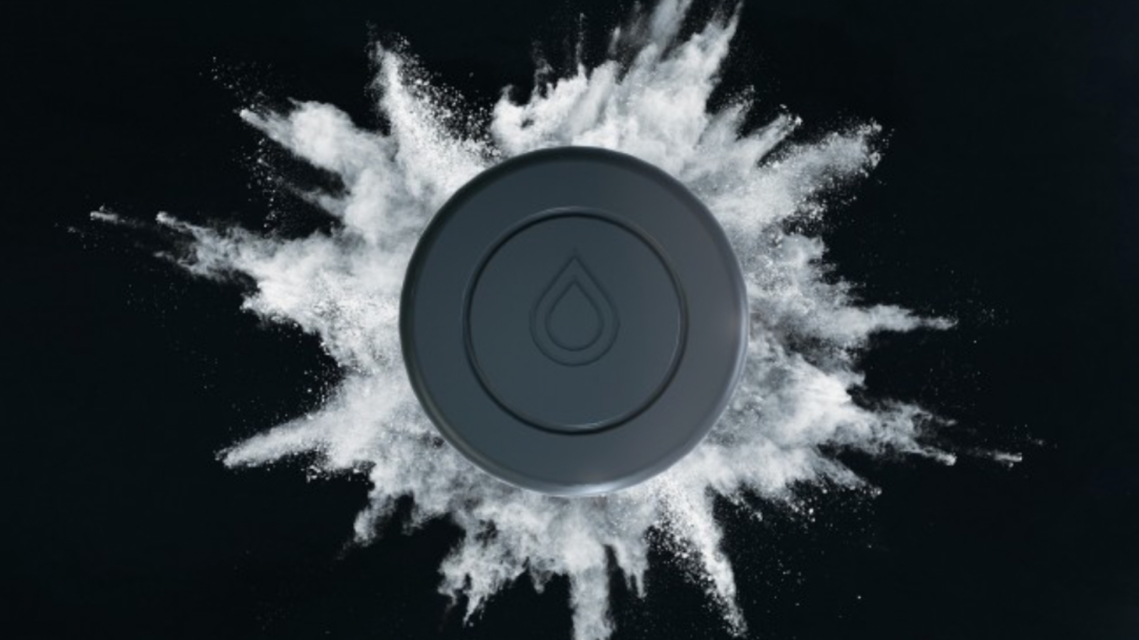 A photo of the Lyvecap cap bursting open with probiotic powder. 