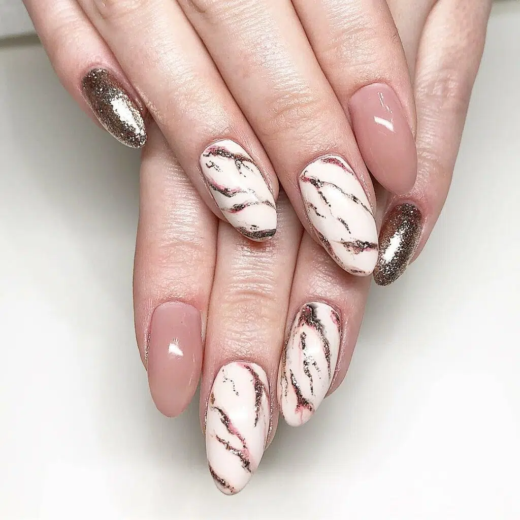 Full view of the gorgeous marble nail with swirls and glitters