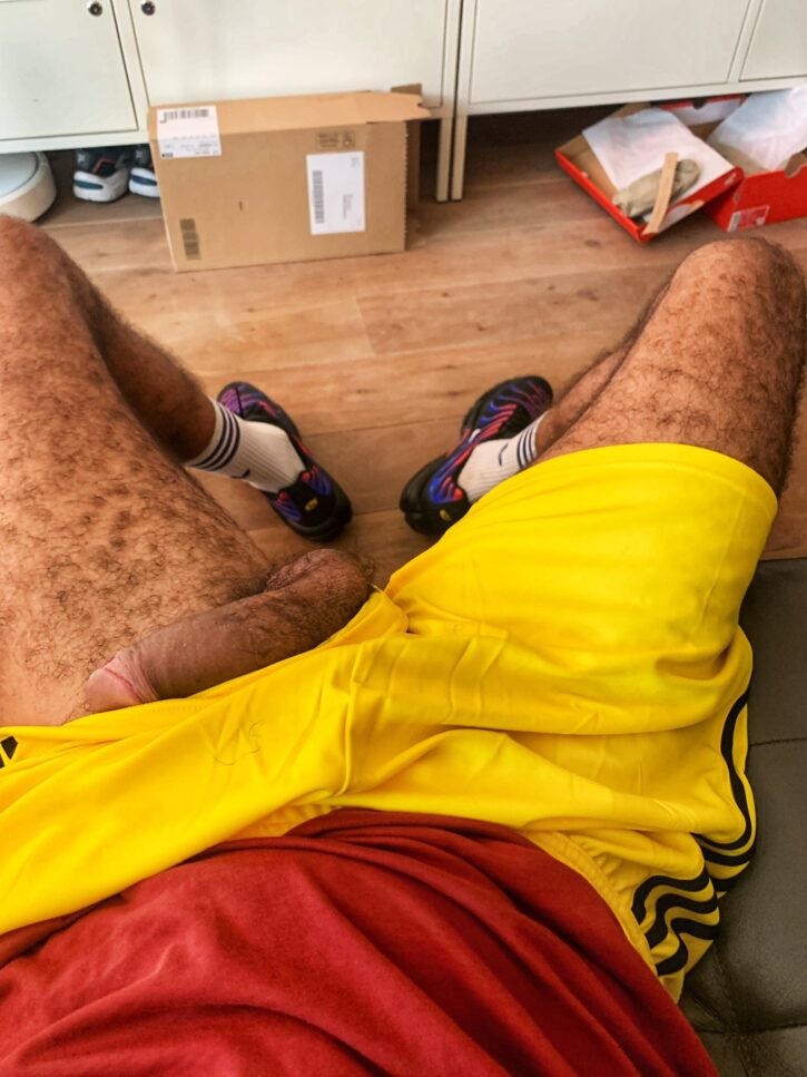 karim yoav wearing yellow athletic shorts with his cock pulled out the side