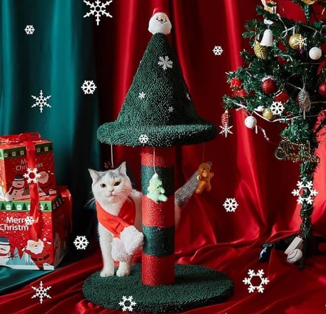 cat in front of the cat christmas tree
